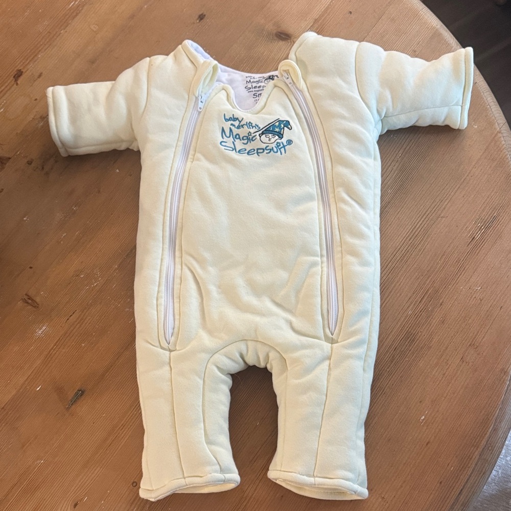 Baby Merlin's Magic Sleepsuit in Soft Cream
